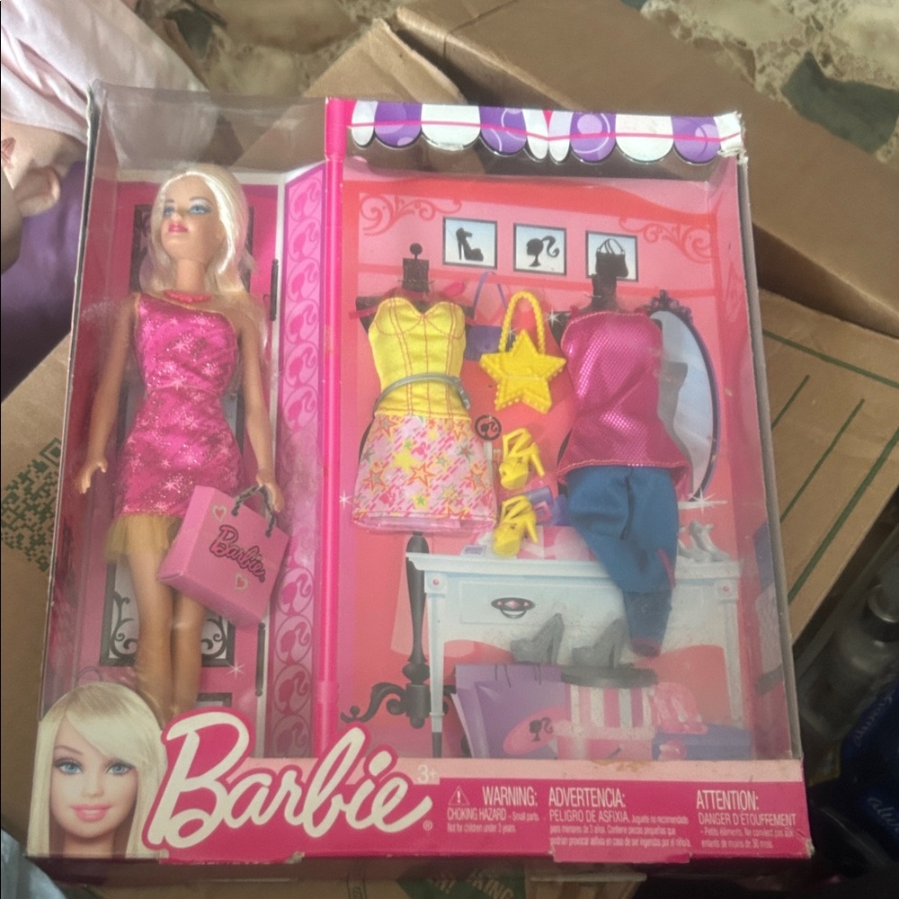 Nib Barbie doll w/outfits